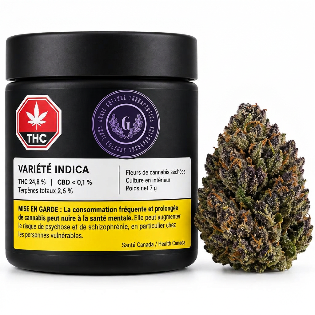 Dark green cannabis bud with purple edges beside a black jar